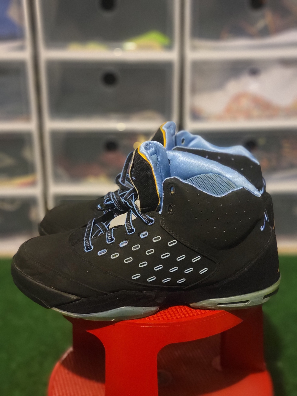 Jordan Melo Black Basketball Shoes with Light Blue Accents